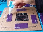 Apply glue to back of offcut
